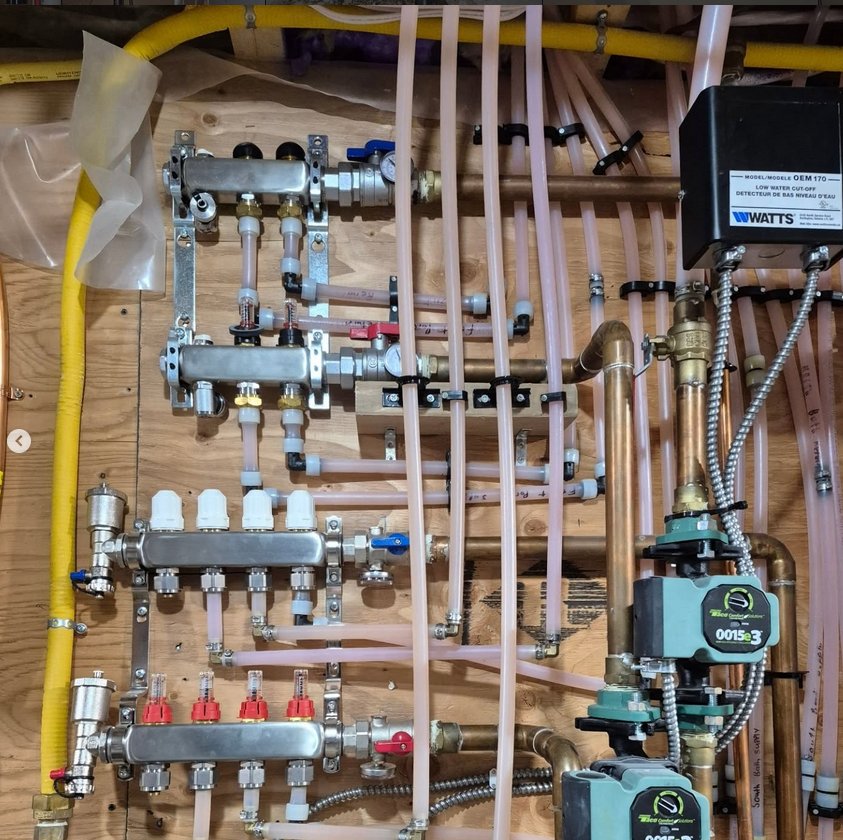 Comfortable Living Plumbing & Heating — hydronic manifold and pump system